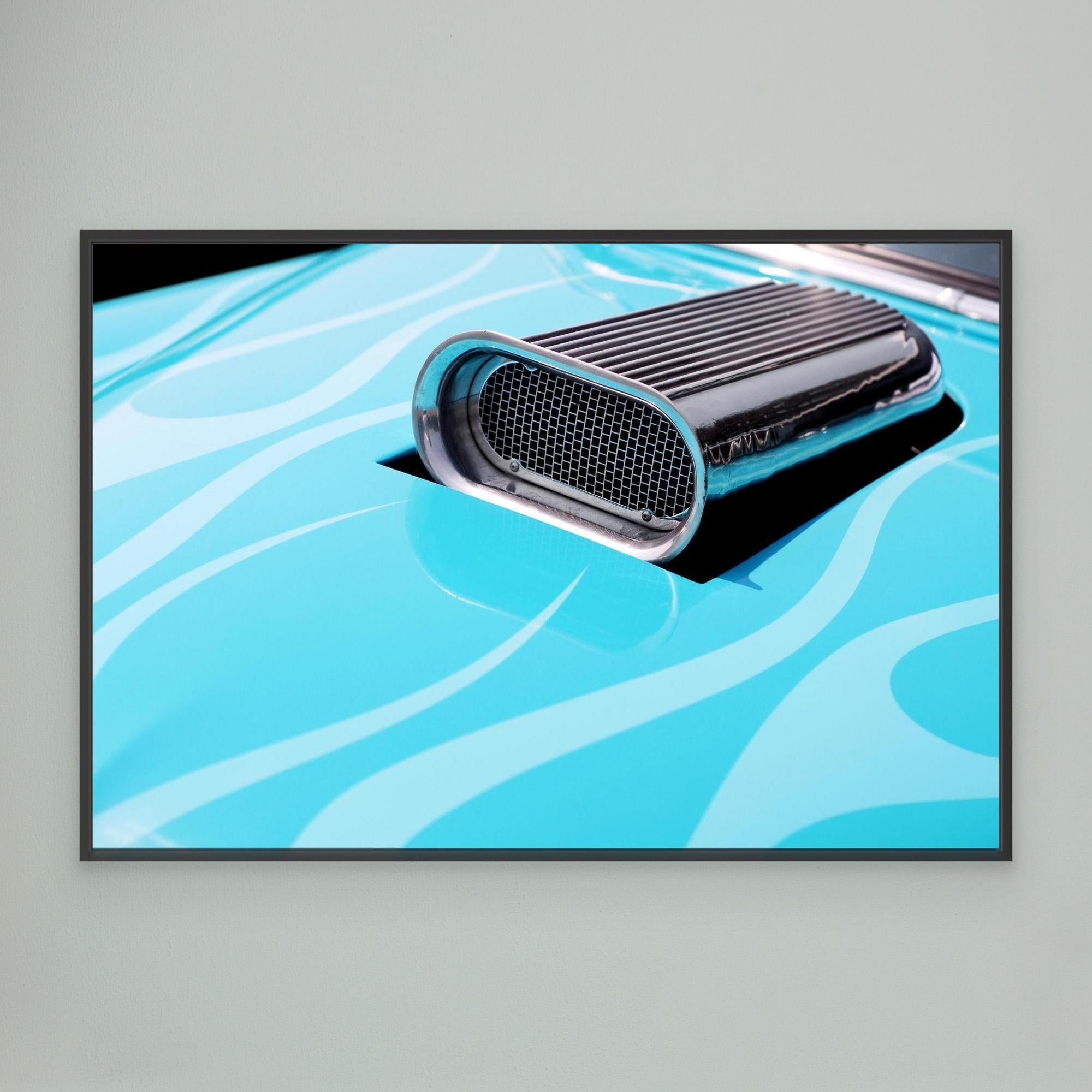 Car air vent on a blue abstract background
