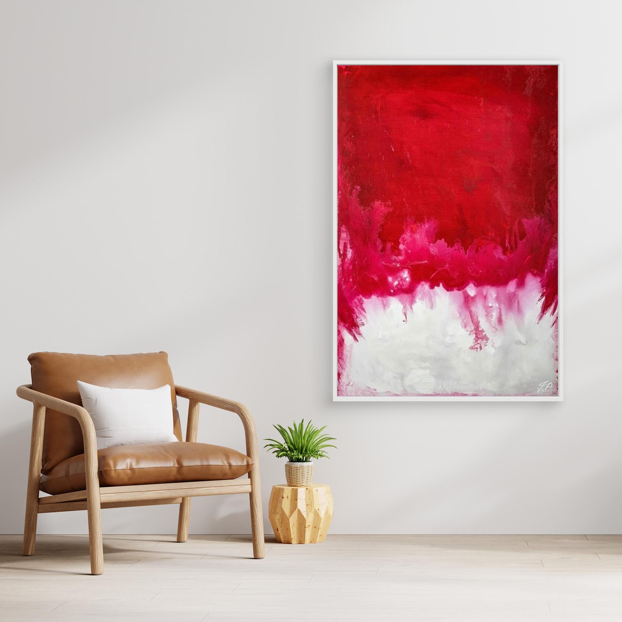 A framed abstract painting with predominantly red and white colors.