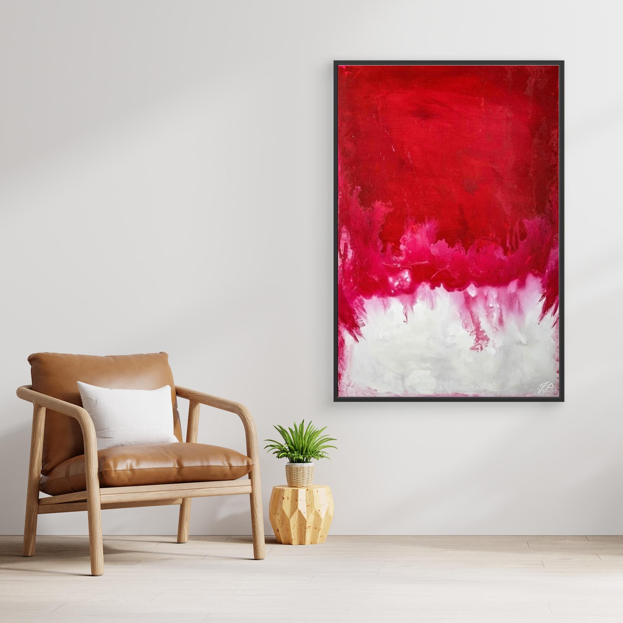 A framed abstract painting with predominantly red and white colors.
