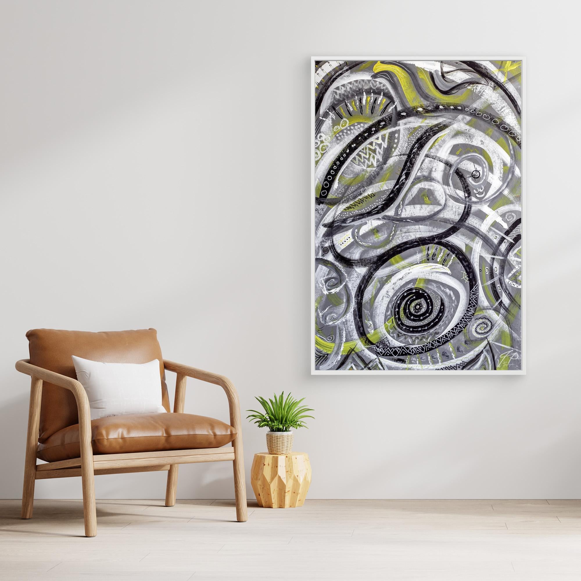 Minimal modern living room with leather chair, plant, and large abstract black, white, and yellow artwork on wall.