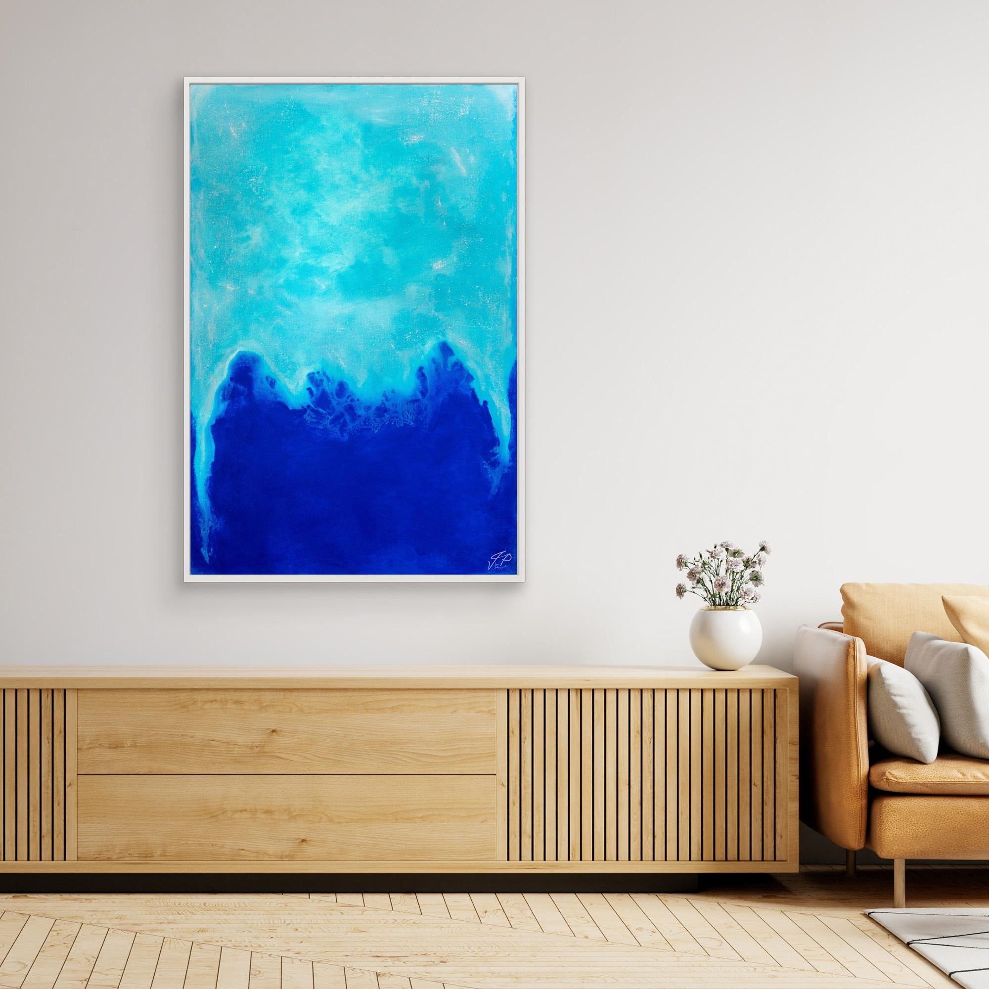 Abstract painting with shades of blue and turquoise, resembling ocean waves, hanging on a light-colored wall.