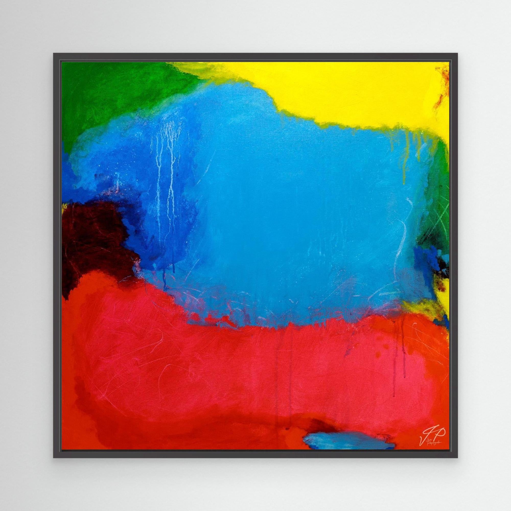 A vibrant abstract painting with prominent blue, red, and yellow colors, framed in a white frame.