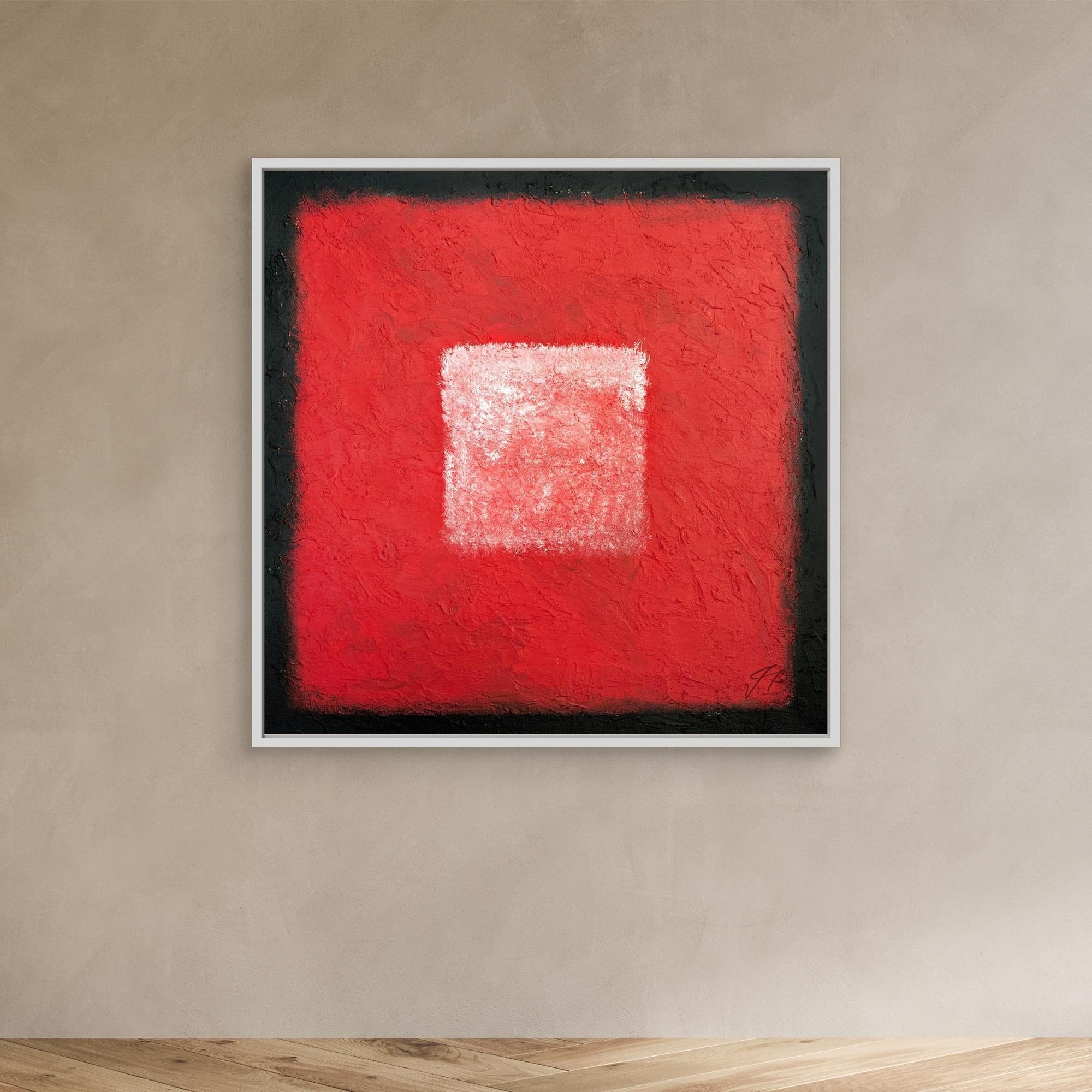 A framed canvas art print featuring a large red square with a smaller white square in the center, set against a black background.