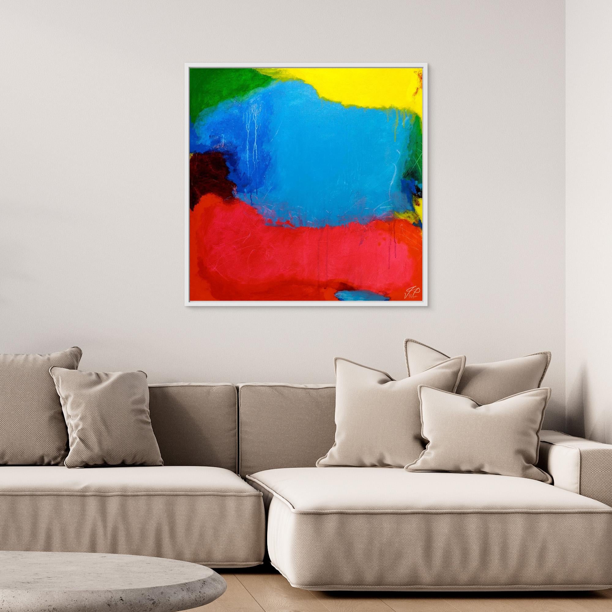 Abstract colorful painting hangs above a beige sectional sofa with neutral pillows in modern living room.