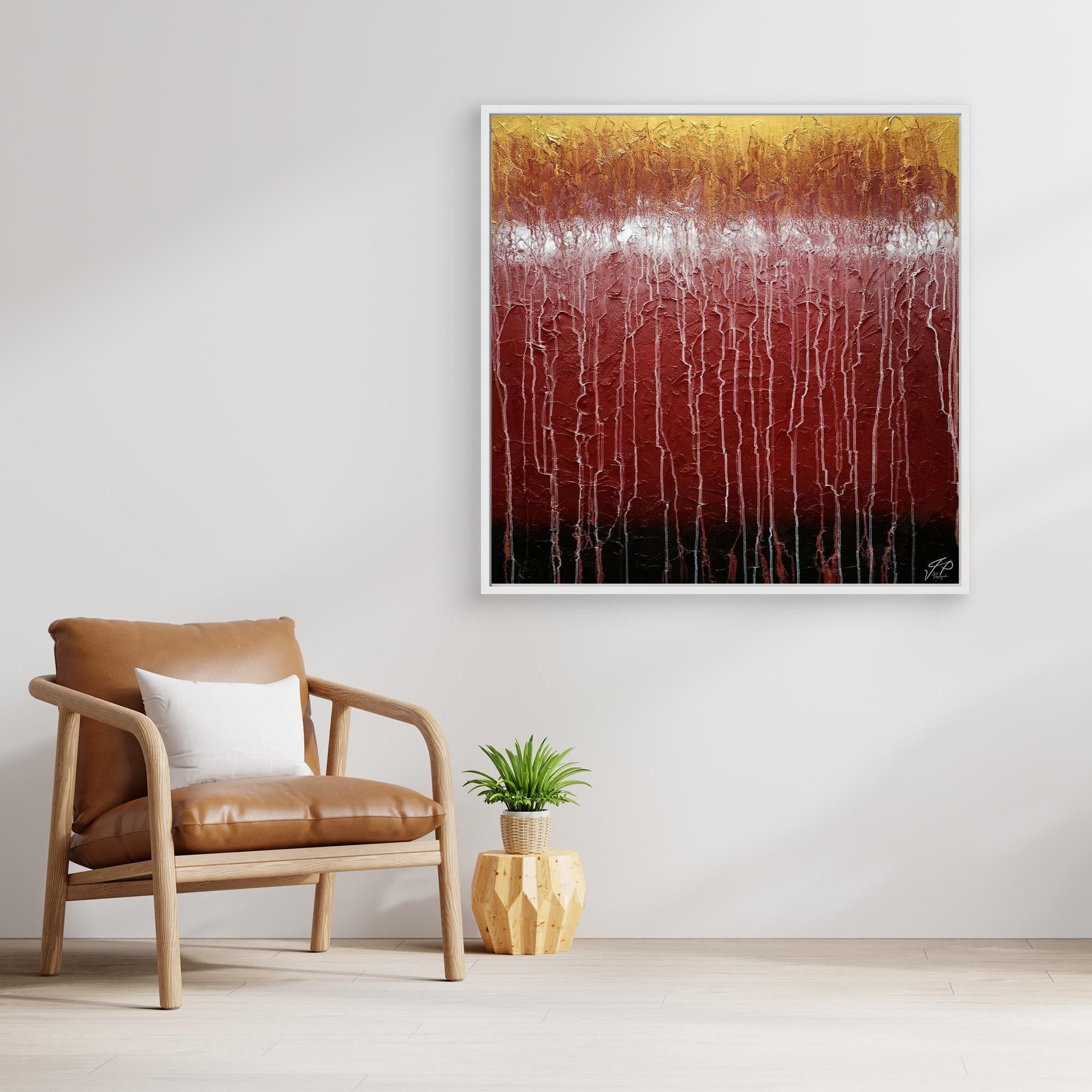 Textured abstract painting with gold, white, red, and black colors above a brown leather chair and small plant.