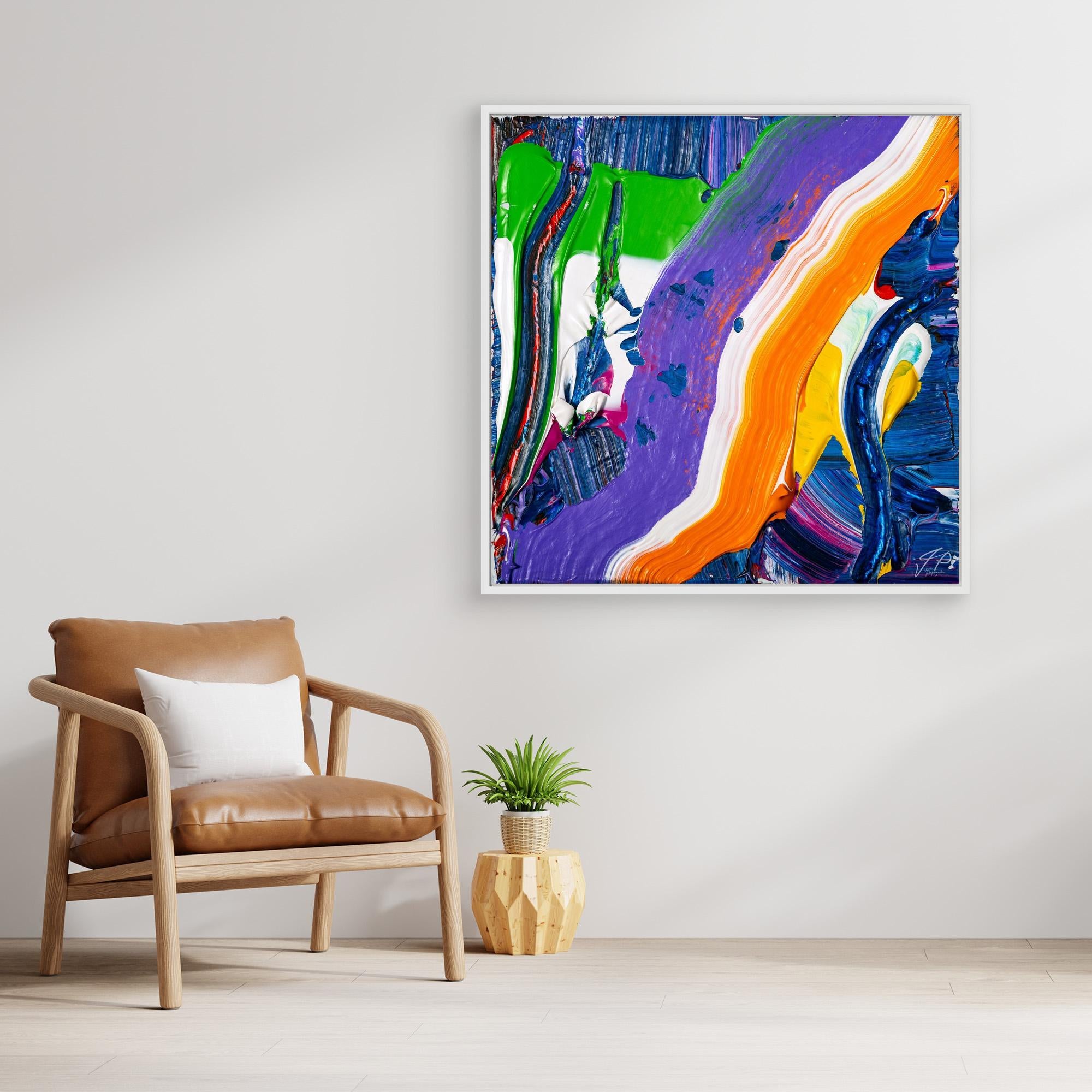 Bold abstract painting with green, purple, orange, and blue strokes hangs above a tan chair and potted plant.