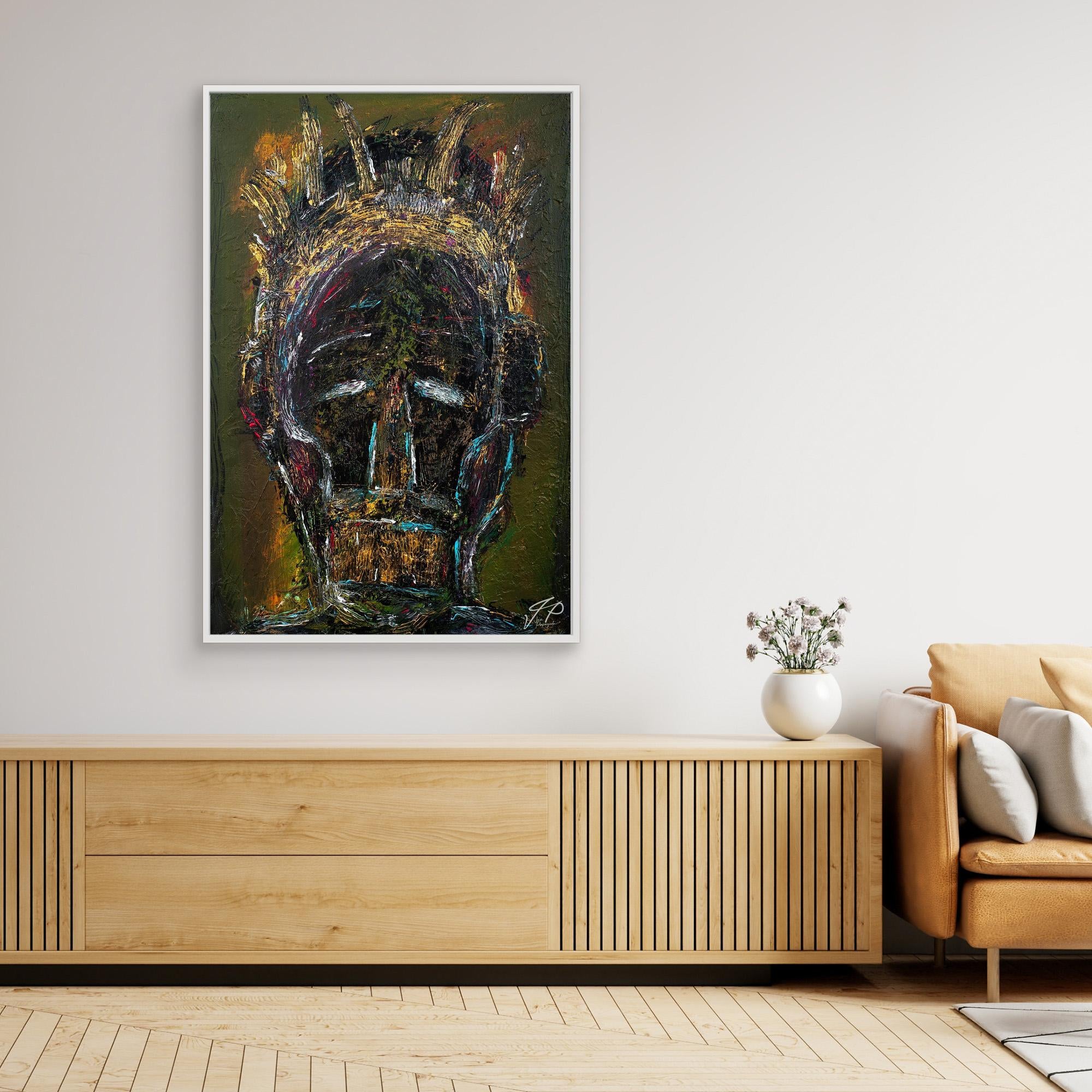 A modern living space with abstract portrait artwork, wooden cabinet, tan sofa, and a vase with flowers.