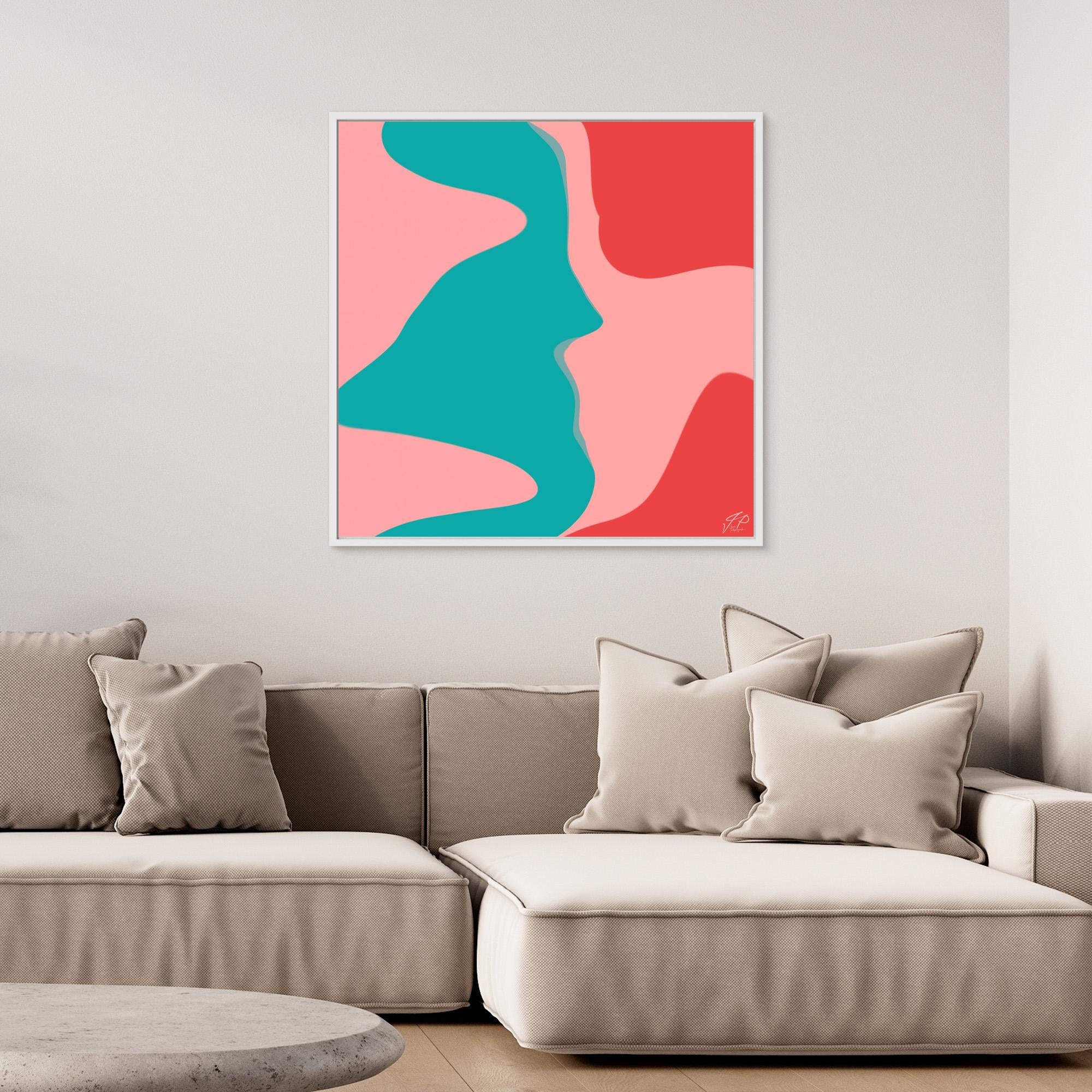 Abstract painting with pink, teal, and red shapes above a beige sectional sofa with cushions.
