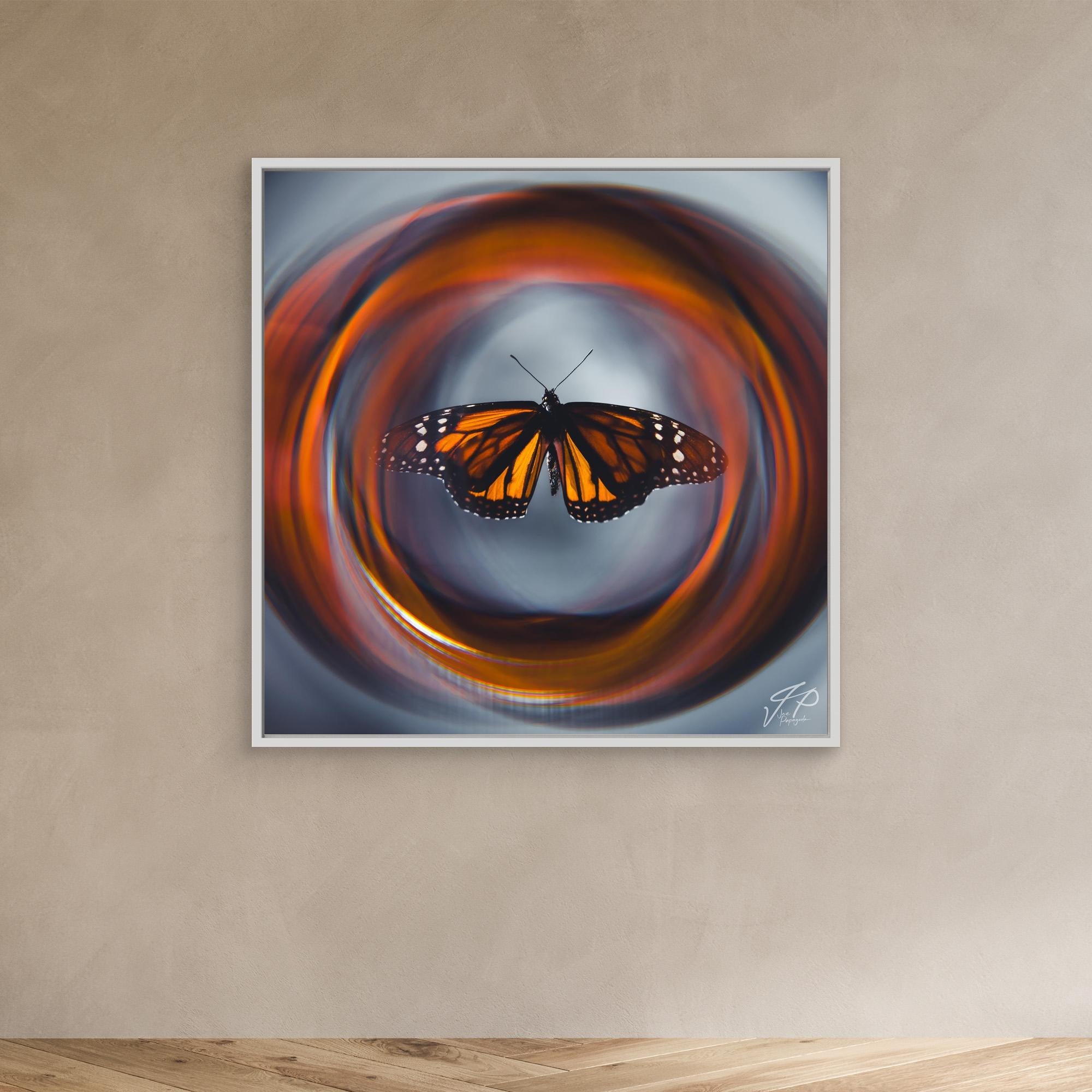 Centered monarch butterfly with orange, black, and white wings, surrounded by abstract swirling orange and gray background.