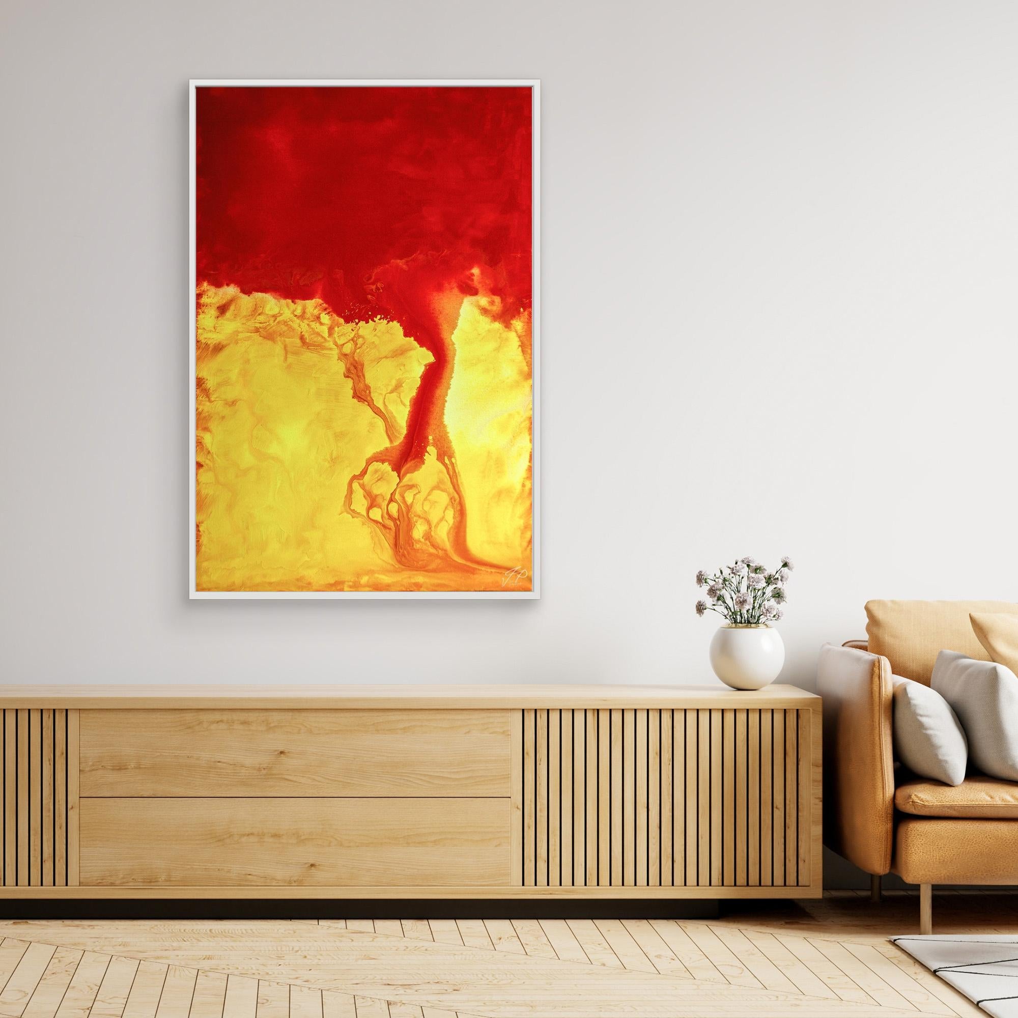 A modern living space features a bold abstract painting in red and yellow above a wooden sideboard.