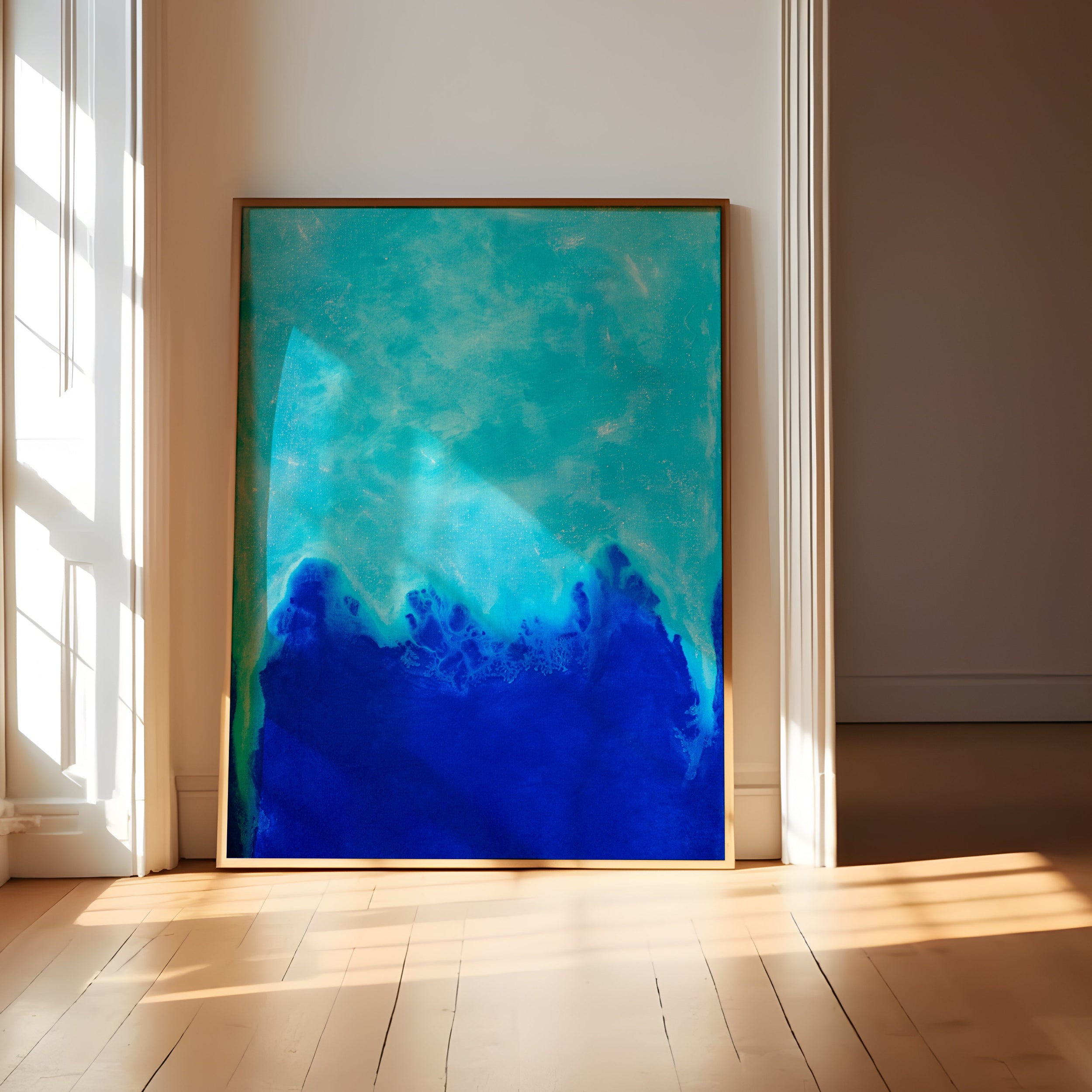 Colorful abstract art print in a solid wood frame on display in a art gallery setting