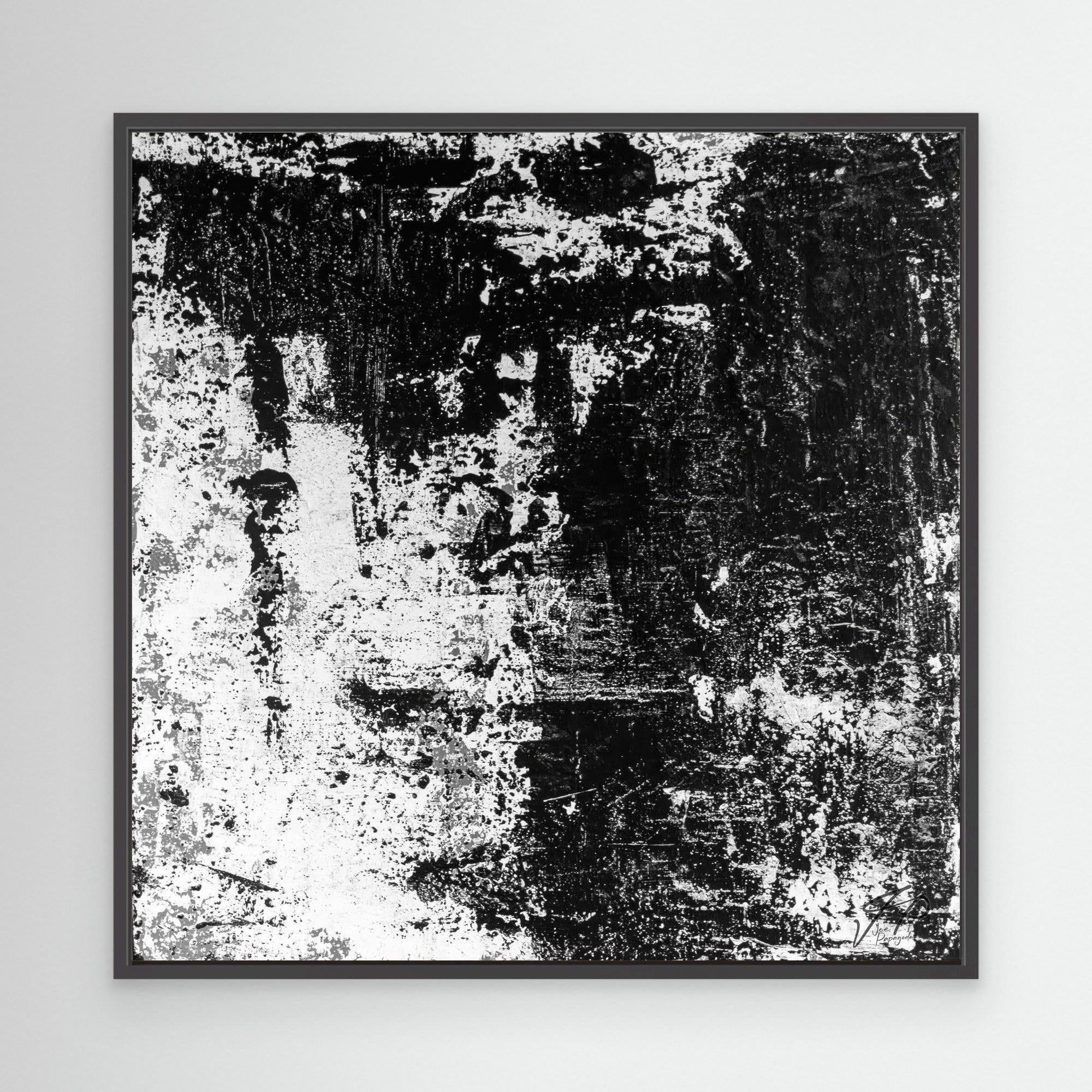 Abstract black and white art print in a black frame on a light gray background